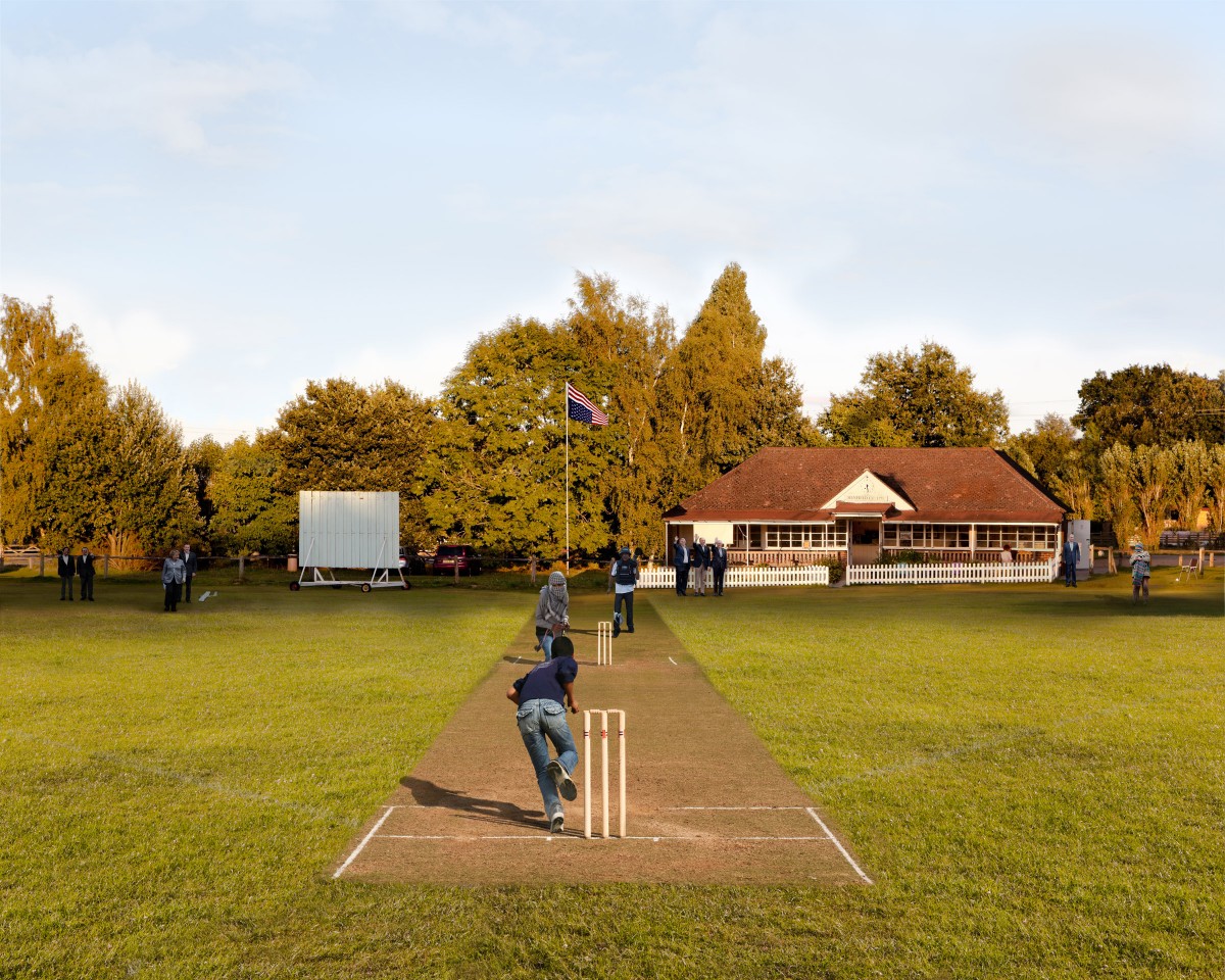 Cricket game between men in military uniform and Heads of State